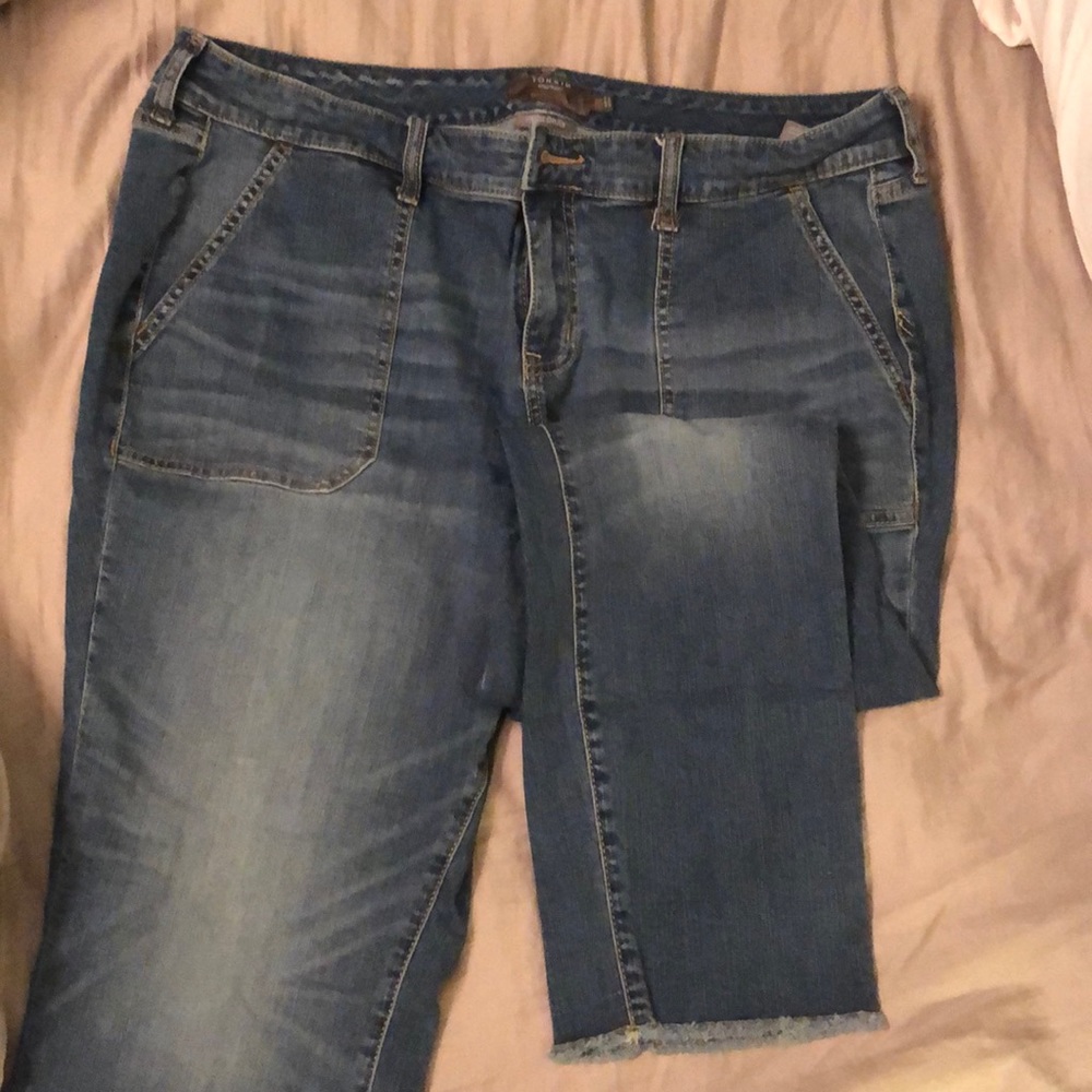 Torrid crop boyfriend jeans with fringe-ish cuff.